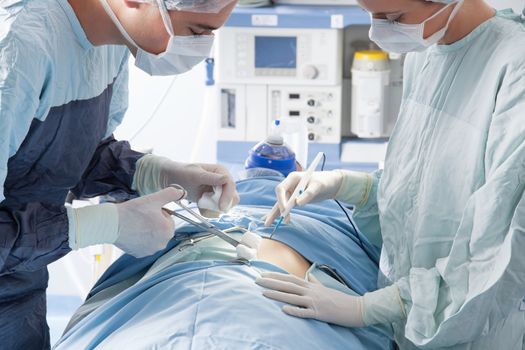 Medical experts during a surgical operation in operation theatre