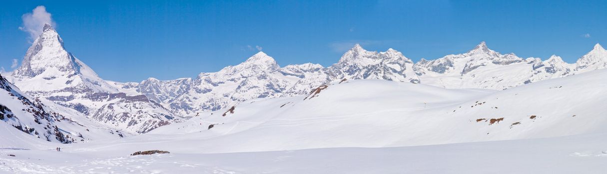 Panorama of Snow Mountain Range Landscape with Blue Sky at Matterhorn Peak Alps Region Switzerland