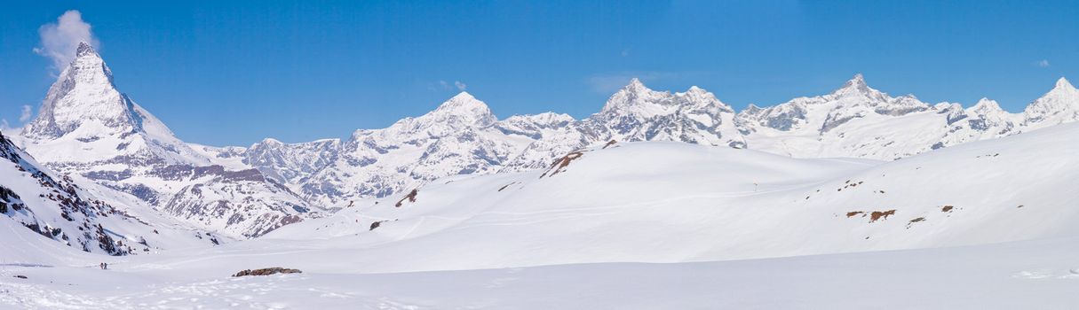 Panorama of Snow Mountain Range Landscape with Blue Sky at Matterhorn Peak Alps Region Switzerland