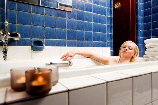 A beautiful blond in an original 1920s style spa and bath