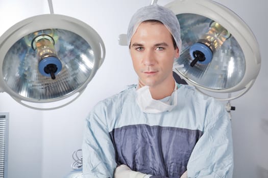 Close-up portrait of confident young male doctor