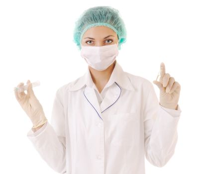 Woman in medical workwear with syringe and ampule with medicine in hands. Isolated on white background.