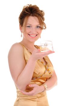 Happy smiling woman in gold dress with perfum bottle isolated on white background