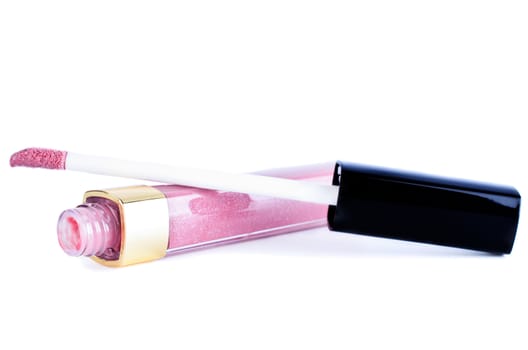 Rose lip gloss close up isolated