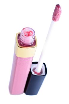 Pink lip gloss close up isolated