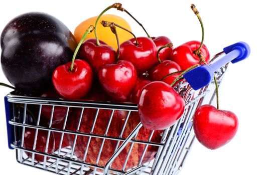 Fruit variety in shopping cart isolated