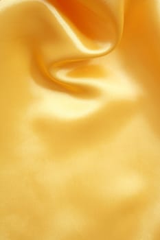 Smooth elegant golden silk can use as background 