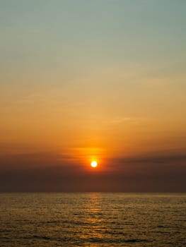 Colorful sky at sunrise over the sea