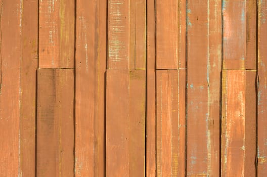 Texture of Orange color paint plank wall for background