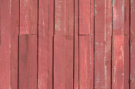 Texture of Red color paint plank wall for background