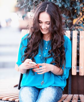 young business woman using mobile phone .