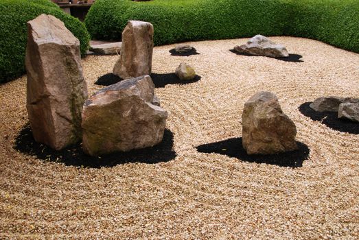 Beautiful zen garden with stones and harmony circles around them
