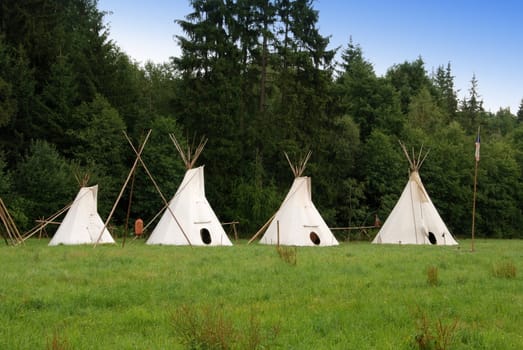 Row of native American sheleters - teepees