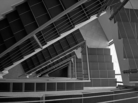           staircase in triangular shape from above to infinity - black and white 