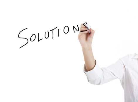 Young businesswoman woman drawing the word solution