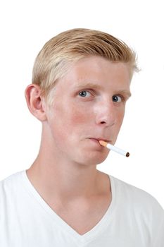 young blond man with cigarette in mouth, isolated over white background