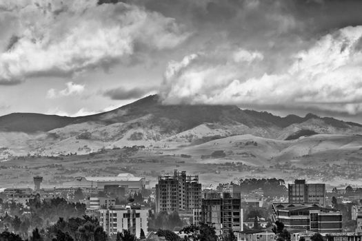 A view of the city of Addis with mountains in the background