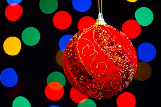 Red Christmas ball with lots of colors light