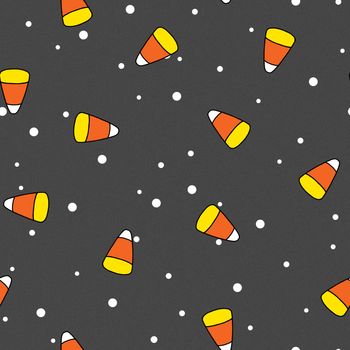 Candy corn tumbles with various sizes of small white dots on dark grey background. Seamless.
