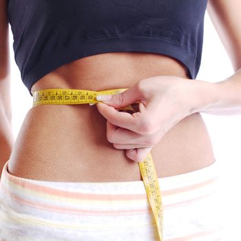 perfect woman hold scales tape