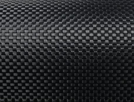 Black woven carbon fibre texture pattern background