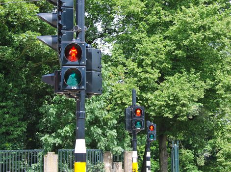 Three red traffic lights in a row 