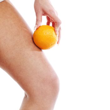 leg and oranges isolated white background 