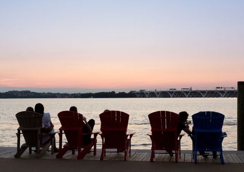 Sunset over the potomac river by Woodrow Wilson bridge on Beltway in National Harbor