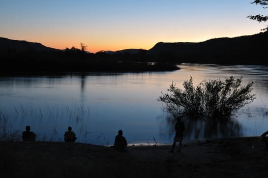 Sunset at Hippo Pools in the Kunene River on the border of Namibia and Angola