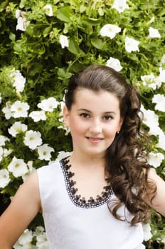 Young girl against flower background