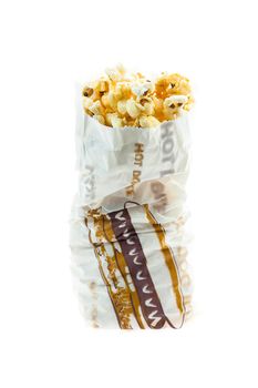 Popcorn in bag isolated on white background