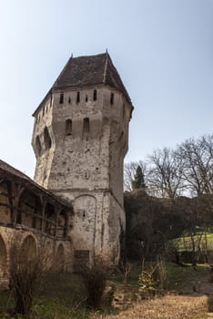 Image of The Tin Coaters Tower from the Sighisoara citadel located in the heart of Transylvania,Romania.The tower has a very complex and strange shape and its walls are riddled with bullets and cannon balls. 