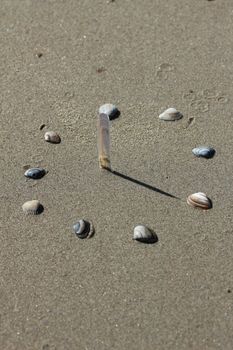 sundial at the beach