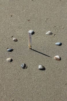 sundial at the beach