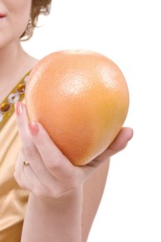 Fresh grapefruit in beauty female hand isolated on white background