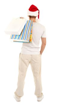 Young men from back side in christmas red hat with paper presents bags isolated on white background