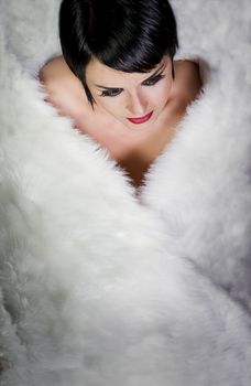 20s style beautiful brunette female wearing fur, swan looking