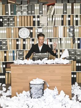 Frustrated Female Author in a messy office