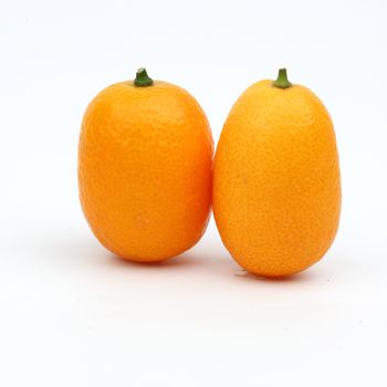 kumquat close up isolated on white
