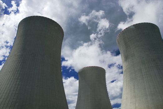 Nuclear power plant towers against the sky