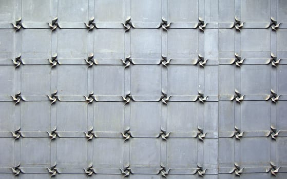        Detail of decorative steel gate with squares   