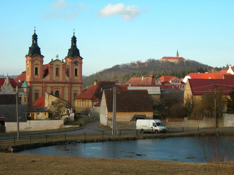 Small Czech village in the country with baroque church