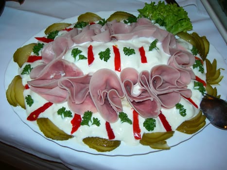           delicious wedding salad with ham, cucumber and peper