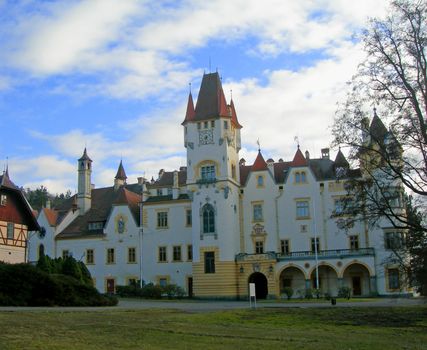                            Beautiful romantic castle against sky in the Czech Republic