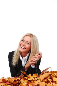 studio portrait of autumn business woman in  yellow leaves