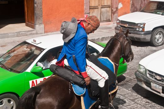 SAN MIGUEL DE ALLENDE, GUANAJUATO/MEXICO � FEBRUARY 15: Mounted police wear traditional uniform in historic town famous for culture and the arts shown on February 15, 2010 in San Miguel de Allende
