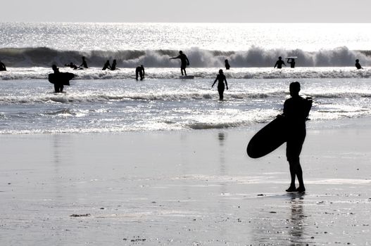 silhouette of a surfer