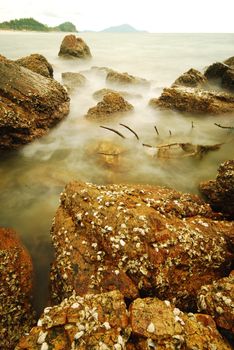 long exposure of beach and rocks