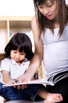 asian mother and child learning