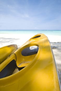 canoe on a beautiful blue beach